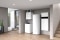 L'immagine mostra diversi prodotti Viessmann come sistema in una casa moderna: un'unità di ventilazione centrale Vitovent 300-W, una pompa di calore Vitocal 300-G, un bollitore Vitocell e un accumulatore di energia Vitocharge VX3.